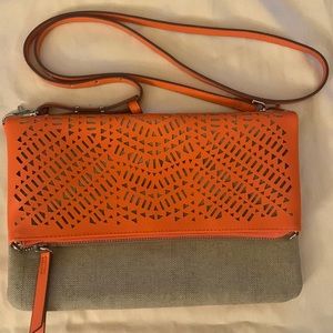 Orange and tan Stella and dot crossbody purse